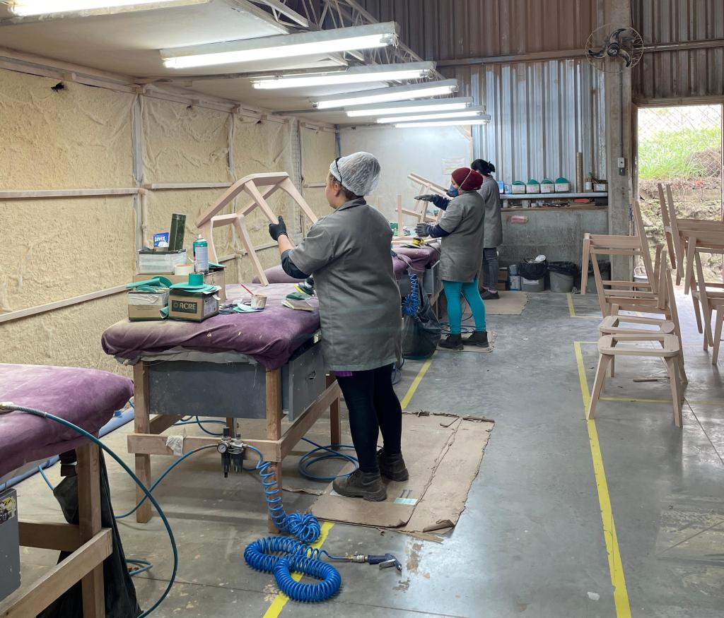 Furniture finishing and assembly line inside a Brazilian furniture factory
