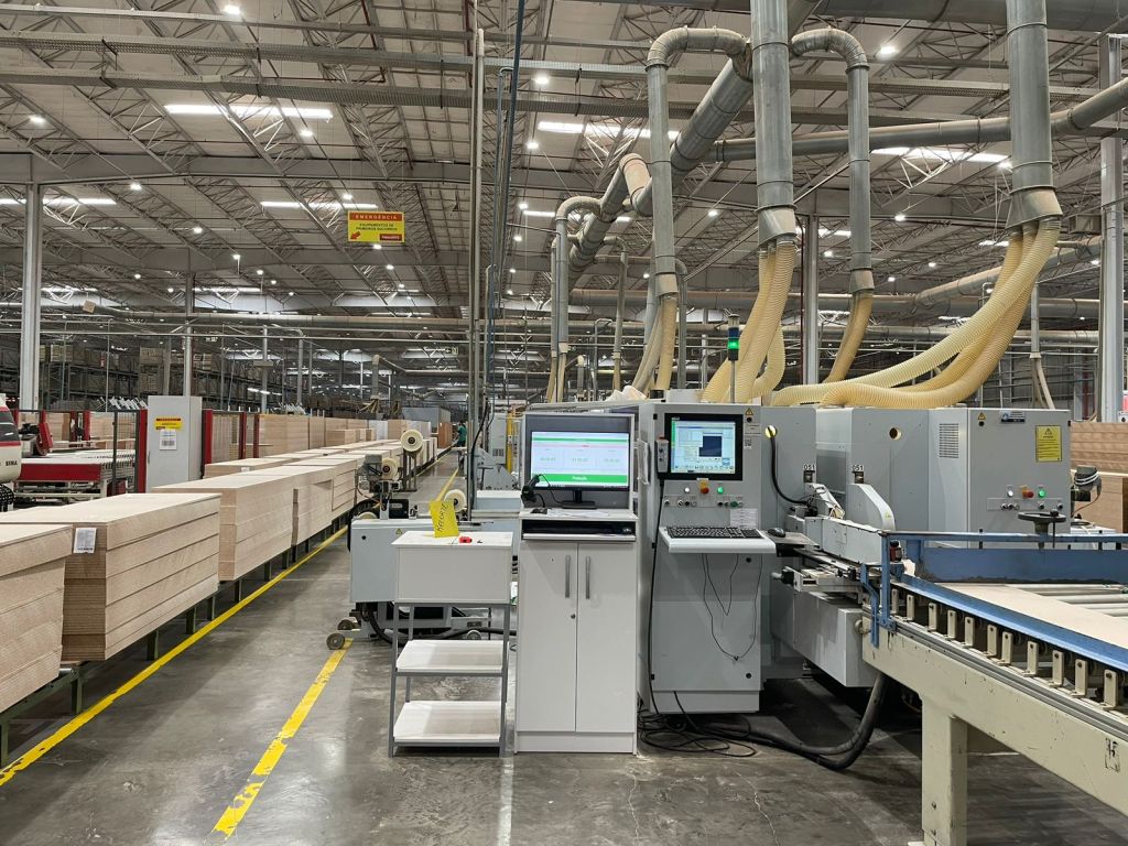 Advanced Brazilian furniture manufacturing facility with automated production lines and export-ready industrial infrastructure.