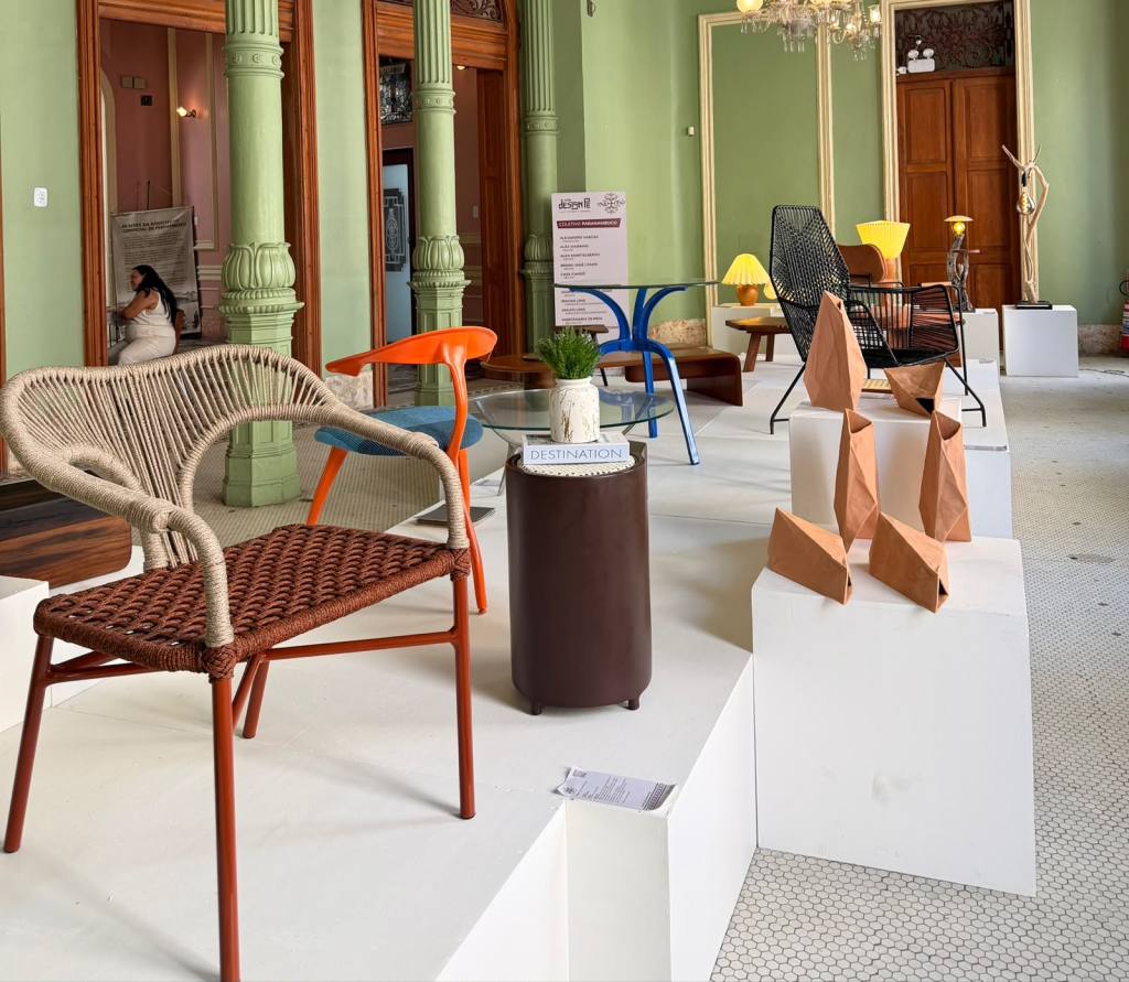 Contemporary Brazilian chair displayed at Design PE exhibition in Recife alongside furniture and design objects by independent designers.