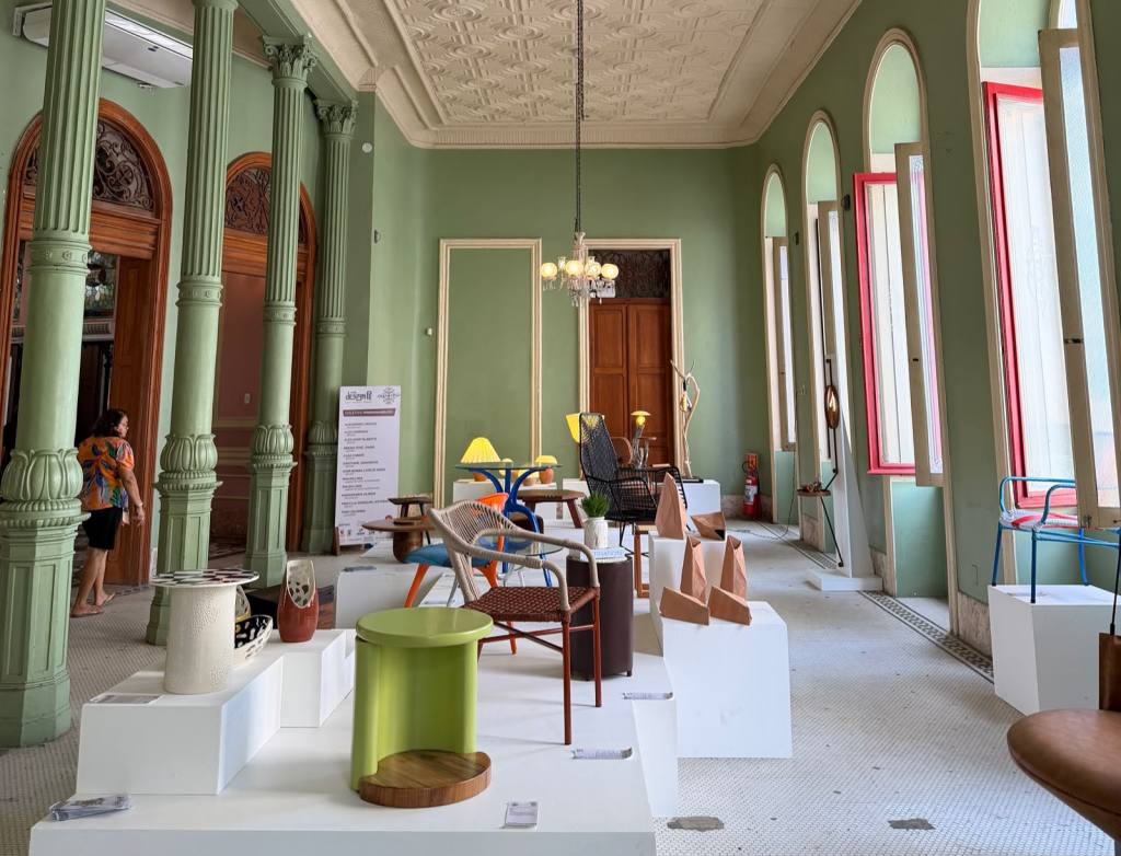 Contemporary Brazilian furniture exhibition inside the historic Palácio do Comércio in Recife, Pernambuco, featuring furniture by independent Brazilian designers.